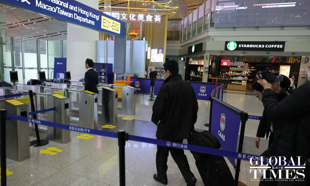 11月18日下午,金井正彰一行离开中国。摄:李昊/Global Times