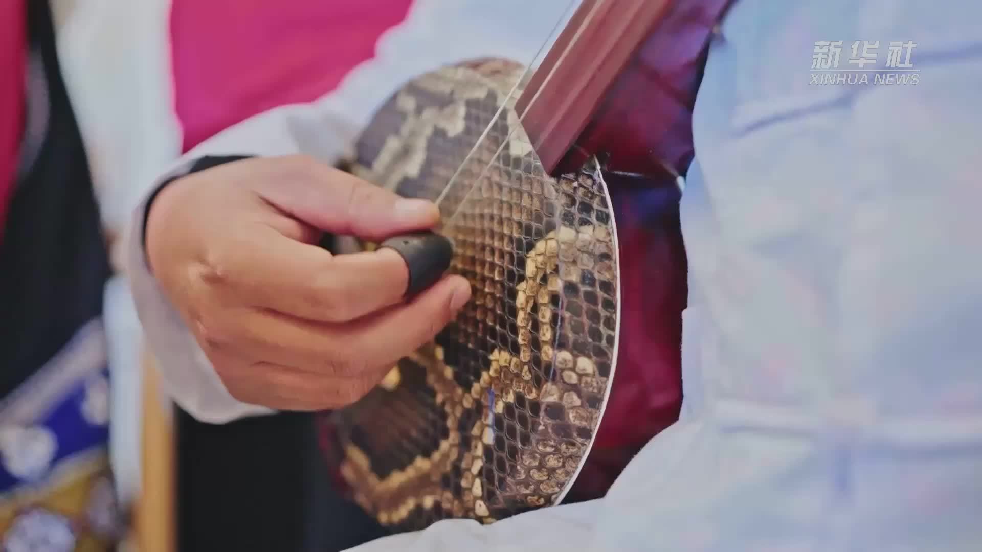 “绕三灵”大本曲世家的传承之路