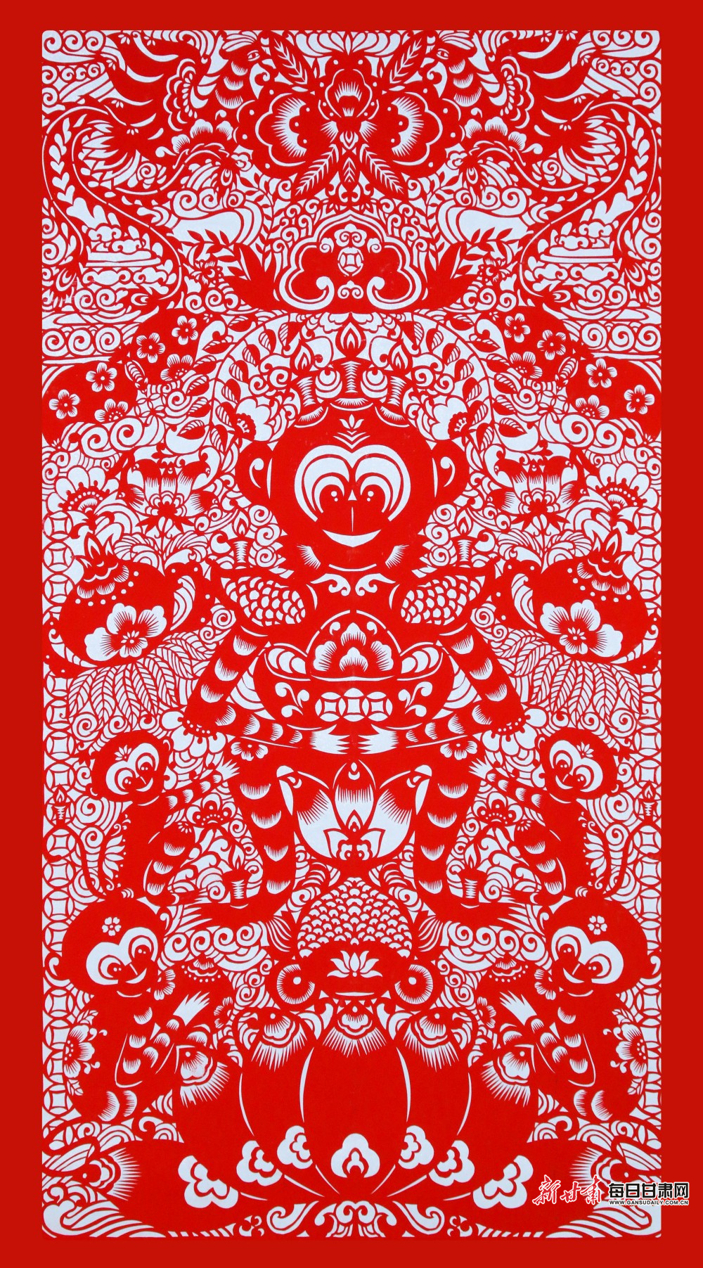 剪纸《点灯背猴》