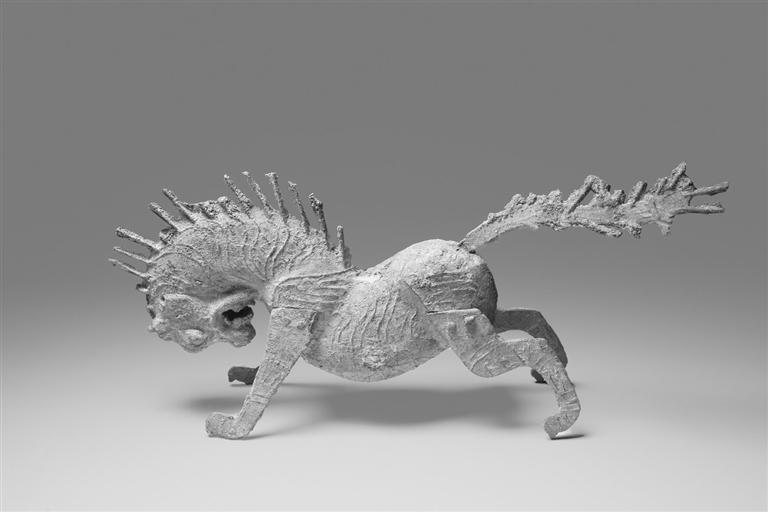 文殊镇团结村九组魏晋墓出土的铜獬豸