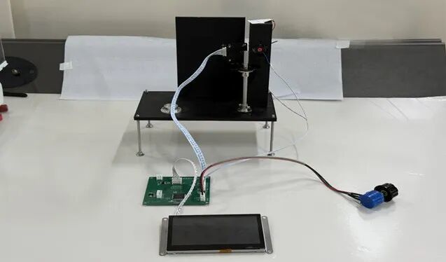 一等獎“基于重力-電磁力矩自平衡原理的微弱壓力測量實驗裝置探究”