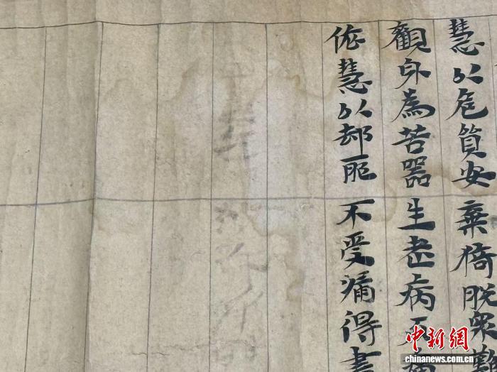 图为前凉写本《法句经》末尾(资料图) 戴文昌 摄