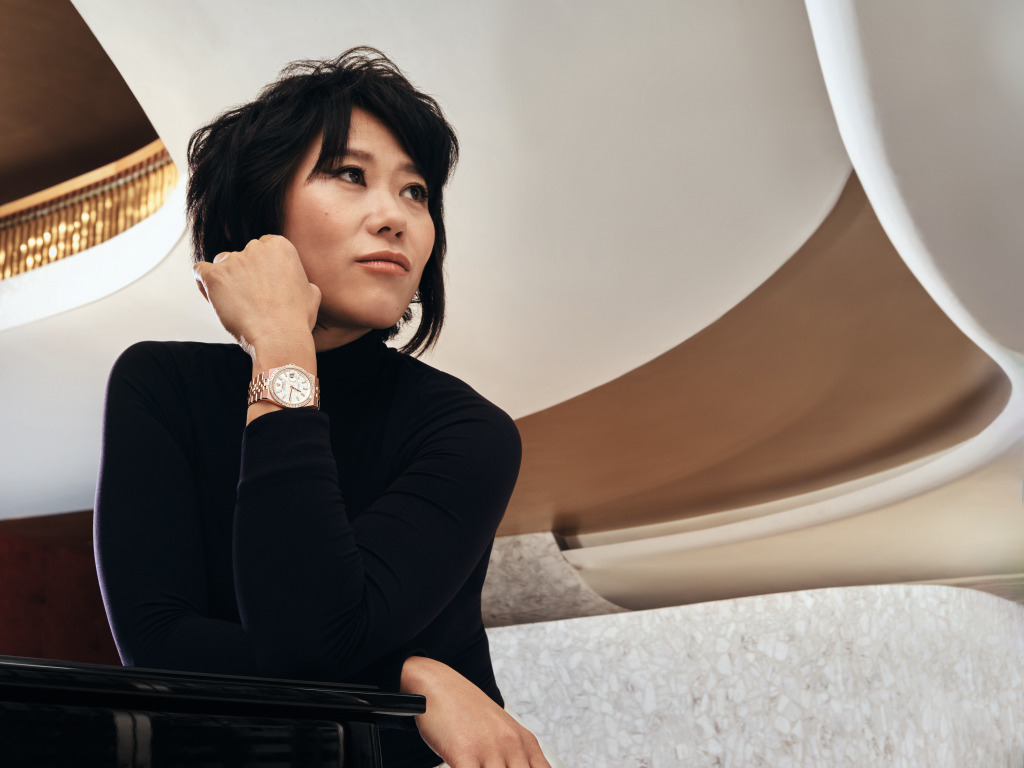 王羽佳佩戴着18K永恒玫瑰金款陆使型36腕表,搭配镶钻外圈。©Rolex/Rory Payne