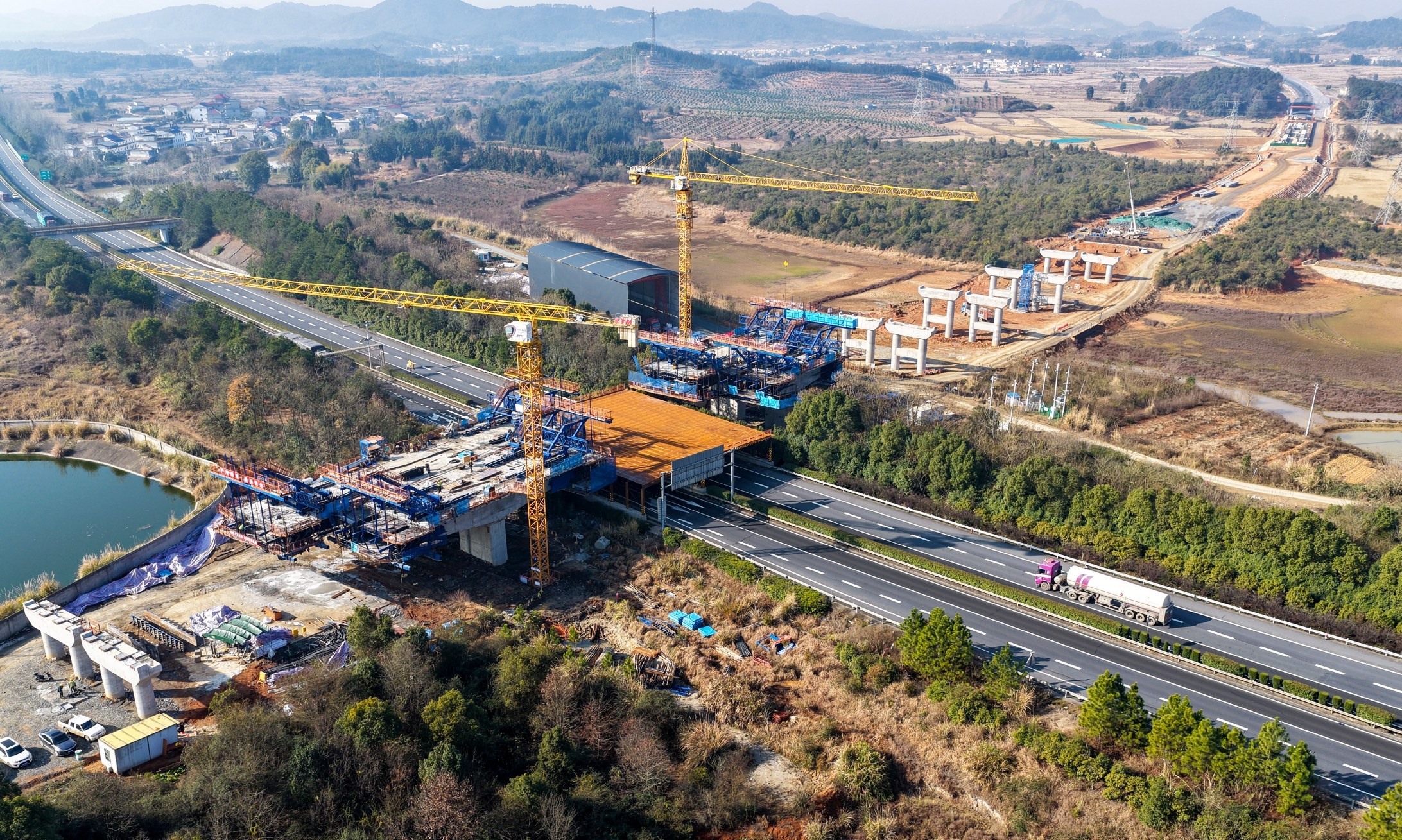 新余抢抓施工黄金季 全力推动渝钤大道等重大项目建设提速
