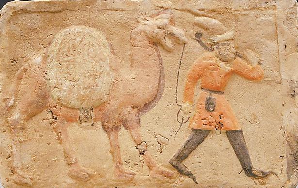 张掖出土的唐代模印彩绘胡商牵驼画像砖