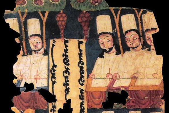 摩尼教僧侣在办公桌上写作。摩尼教抄本残页“MIK III 6368”正面(局部),手稿来自高昌遗址。