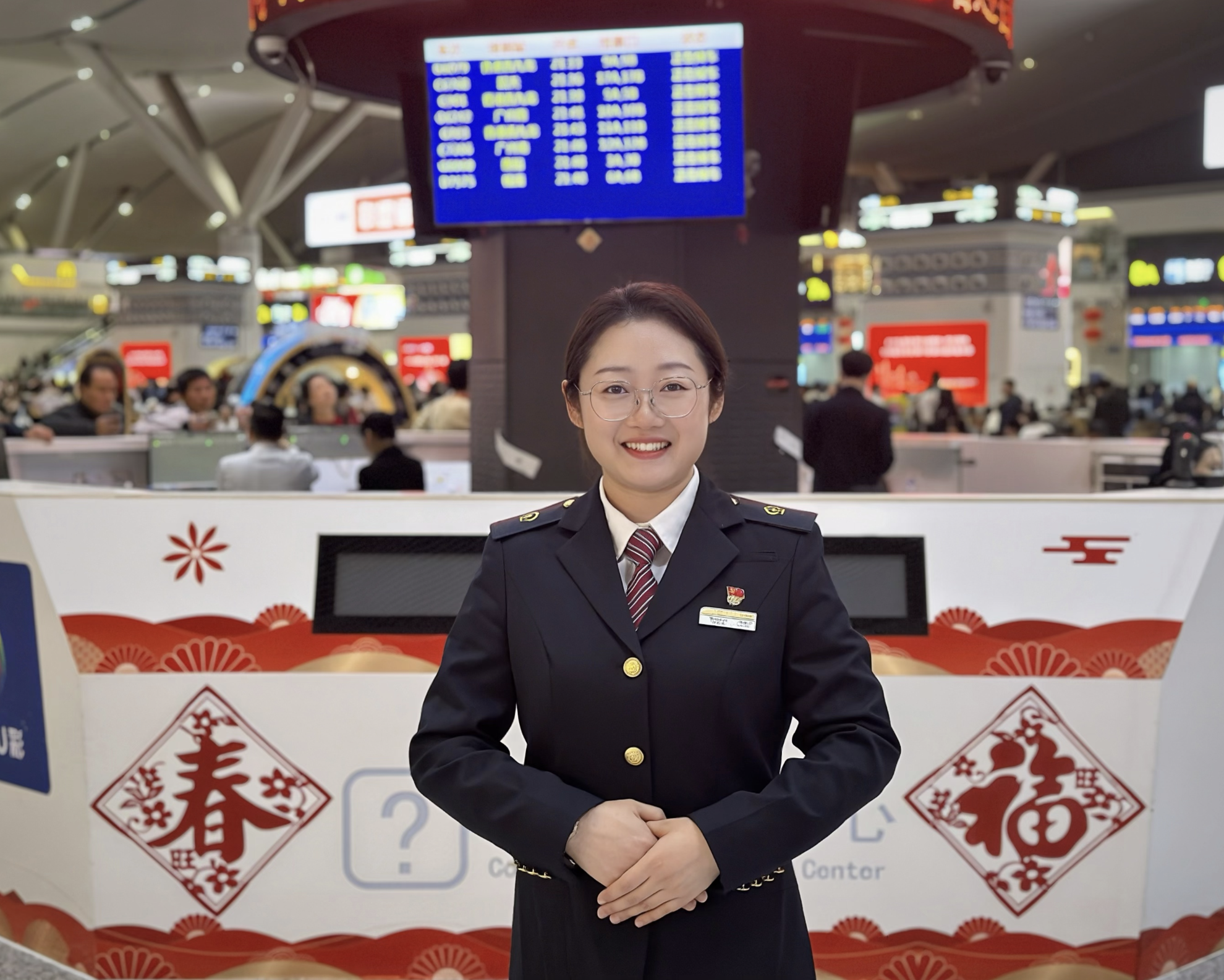 坚守春运一线13载 做旅客心中的“迎春花”