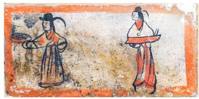 出土于嘉峪关新城魏晋墓六号墓,位于中室西壁从上而下第四层,画面内容为二仆人前行送食,一仆人托钵,后一仆人手托长案,案上放有碗装食物。
