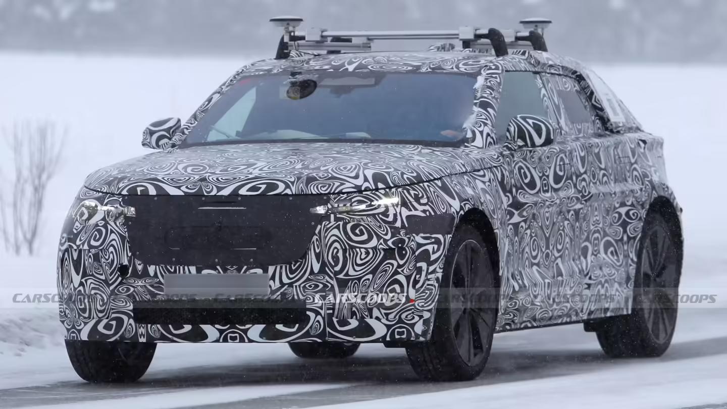 纯电版路虎揽胜星脉SUV路测图曝光:低趴车身、隐藏式门把手