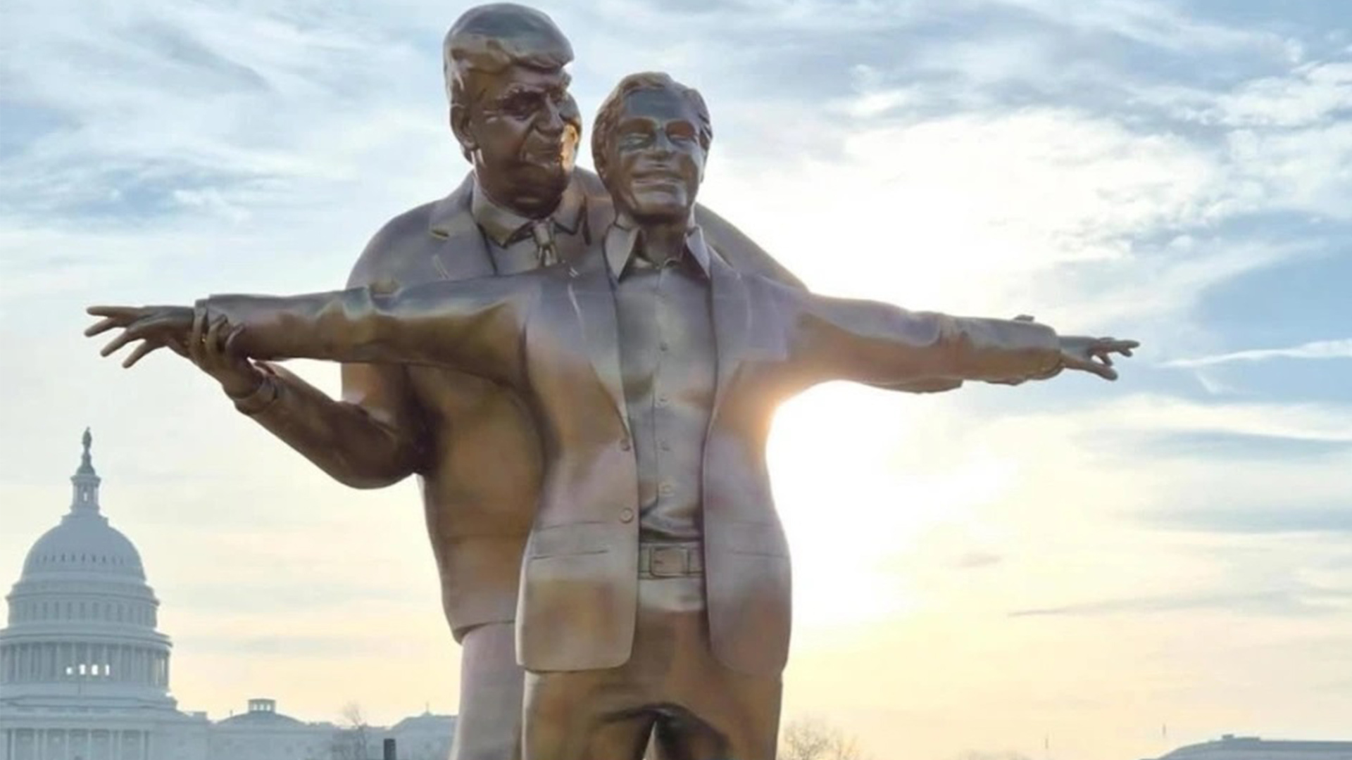 “特朗普从身后拥抱爱泼斯坦”雕像重现电影《泰坦尼克号》经典船头姿势，被安置在美国国家广场，讽刺两人之间的“友谊”