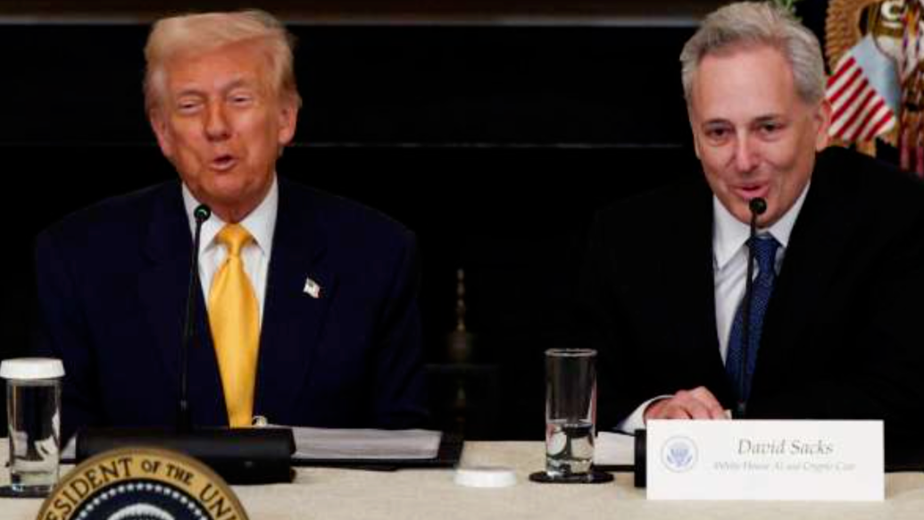 萨克斯(右)与特朗普