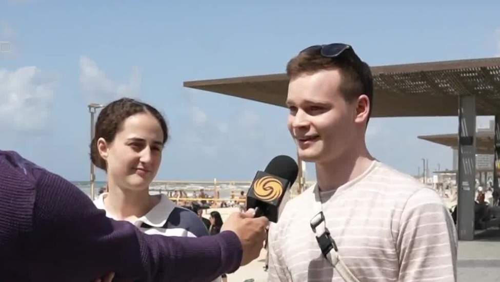 以色列战争阴霾仍在，民众不顾禁令涌向海边