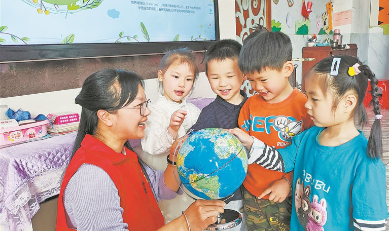 奉新县：珍爱地球 从小做起（图）