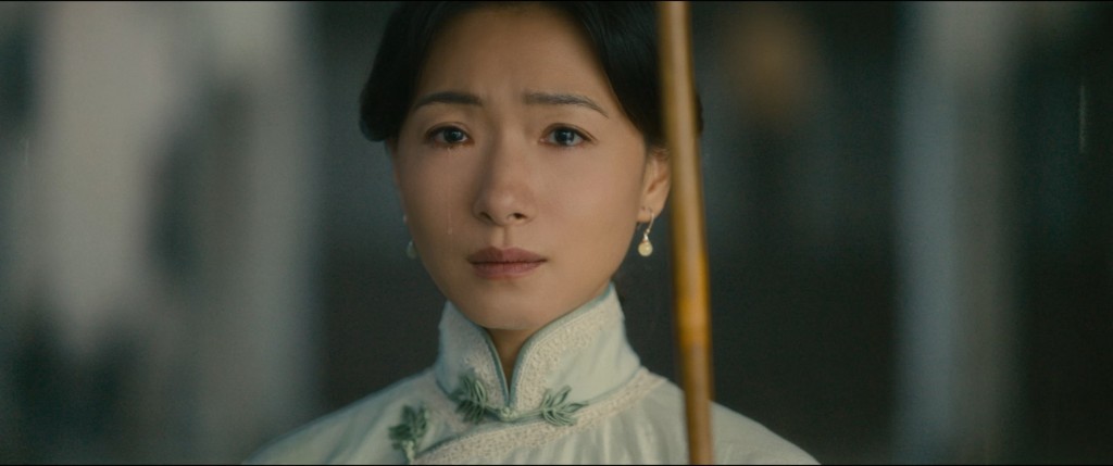 丁玉娇雨中送别丈夫张云魁