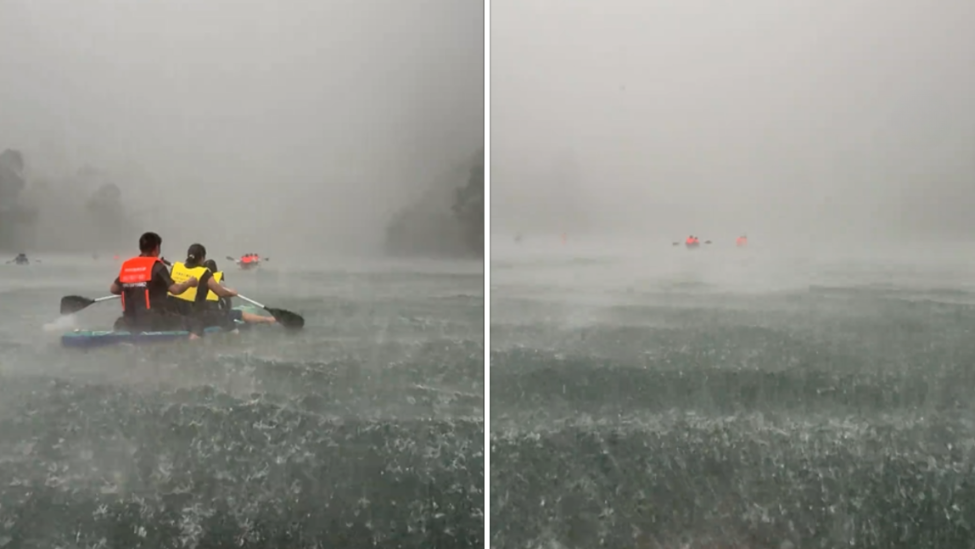 游客玩桨板时突遇冰雹暴雨，河面水雾茫茫仿佛渡劫