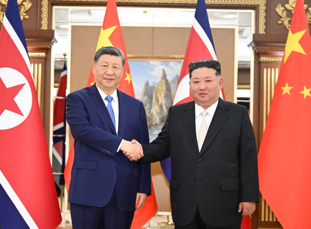 当地时间6月8日下午,中共中央总书记、国家主席习近平在平壤锦绣山迎宾馆同朝鲜劳动党总书记、国务委员长金正恩举行会谈。新华社记者 燕雁 摄