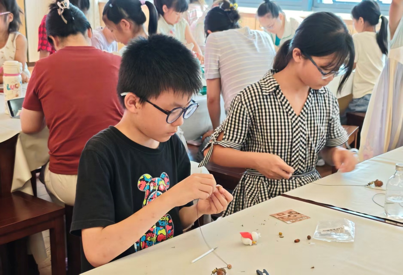“巧手做药绳、浓浓端午情”活动