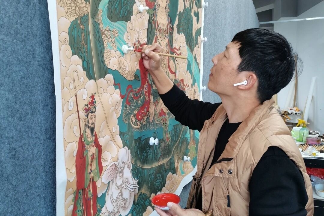 （绘画中的李志永）