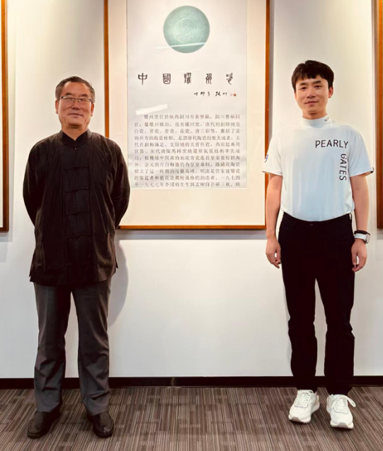 孟树锋老师与儿子孟鸣合影