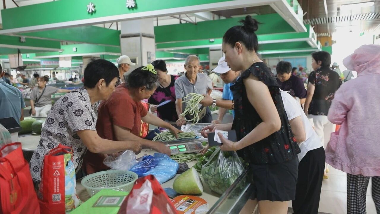 江西彭泽：民生暖人心 菜场吹起清凉风