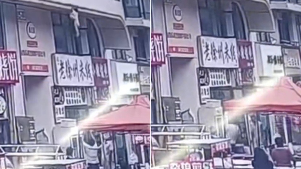 2岁女童从6米高坠落，男子果断上前徒手接住