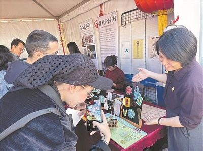 海昏文创亮相法国里昂领事节 文物冰箱贴、立体书成为“文化使者”