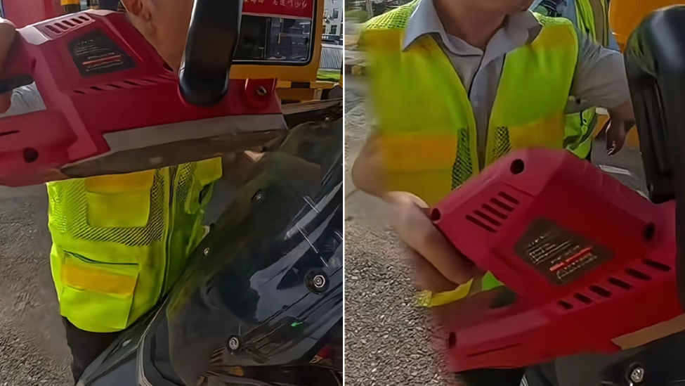 高速收费站工作人员手持电锯拦截摩托车